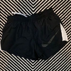 Black Nike shorts.